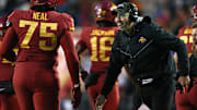 Dec 29, 2023; Memphis, TN, USA; Iowa State Cyclones head coach Matt Campbell (right) reacts with Iowa State Cyclones offensive linemen James Neal (75) during the second half against the Memphis Tigers at Simmons Bank Liberty Stadium. Mandatory Credit: Petre Thomas-Imagn Images