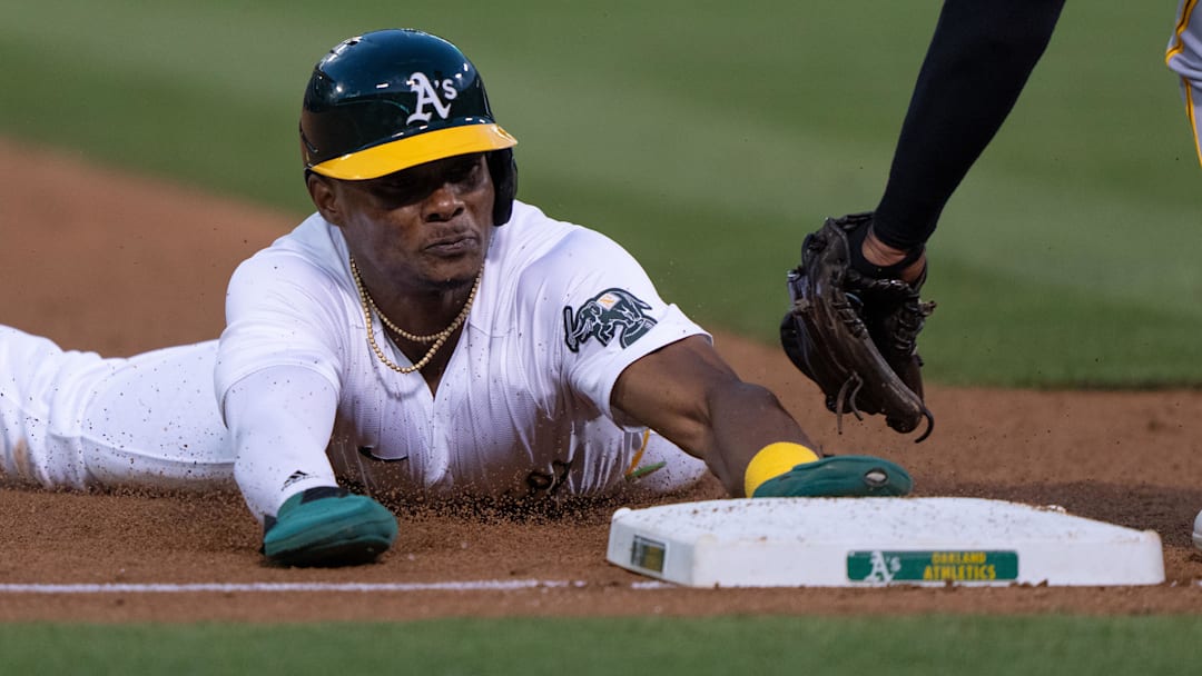 Oakland Athletics outfielder Esteury Ruiz (1) slides 