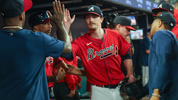 Sep 27, 2024; Atlanta, Georgia, USA; Atlanta Braves starting pitcher Max Fried (54) is congratulated by teammates after being removed from a game against the Kansas City Royals in the ninth inning at Truist Park. Mandatory Credit: Brett Davis-Imagn Images