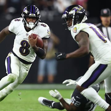 Sep 13, 2021; Paradise, Nevada, USA; Baltimore Ravens quarterback Lamar Jackson (8) against the Las Vegas Raiders during Monday Night Football at Allegiant Stadium. Mandatory Credit: Mark J. Rebilas-Imagn Images