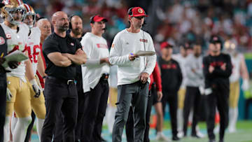 Dec 22, 2024; Miami Gardens, Florida, USA; San Francisco 49ers head coach Kyle Shanahan watches from the sideline against the Miami Dolphins during the fourth quarter at Hard Rock Stadium.