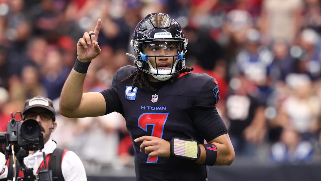 Jan 4, 2026; Houston, Texas, USA;  Houston Texans quarterback C.J. Stroud (7) runs off the field after throwing a touchdown against the Indianapolis Colts during the first half at NRG Stadium. Mandatory Credit: Troy Taormina-Imagn Images