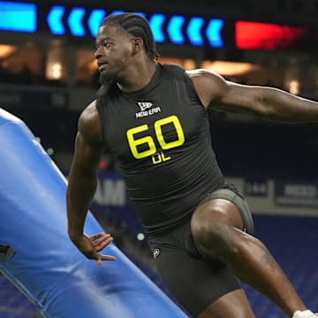 Feb 27, 2025; Indianapolis, IN, USA; Virginia Tech defensive lineman Antwaun Powell-Ryland (DL60) participates in drills during the 2025 NFL Combine at Lucas Oil Stadium. Mandatory Credit: Kirby Lee-Imagn Images
