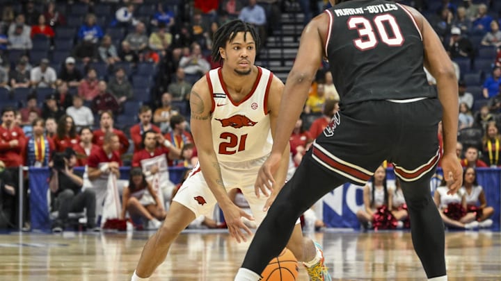 Mar 12, 2025; Nashville, TN, USA; Arkansas Razorbacks guard D.J. Wagner (21) dribbles the ball against the South Carolina Gamecocks during the first half at Bridgestone Arena. Mandatory Credit: Steve Roberts-Imagn Images Mar 12, 2025; Nashville, TN, USA; Arkansas Razorbacks guard D.J. Wagner (21) dribbles the ball against the South Carolina Gamecocks during the first half at Bridgestone Arena. Mandatory Credit: Steve Roberts-Imagn Images