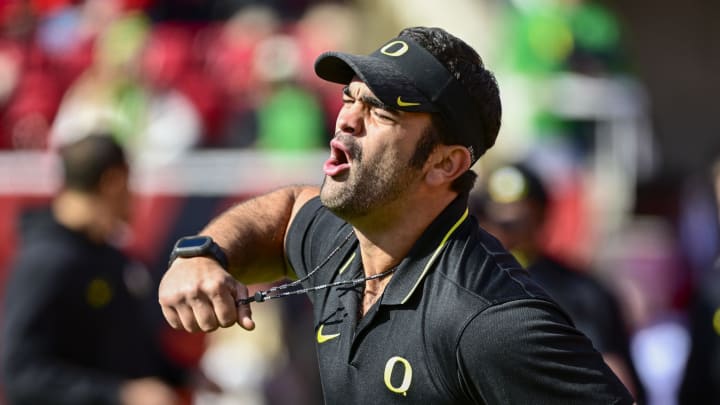 Oct 28, 2023; Salt Lake City, Utah, USA; Oregon Ducks head football conditioning coach Wilson Love calls drills before a game against the Utah Utes at Rice-Eccles Stadium. Mandatory Credit: Christopher Creveling-USA TODAY Sports Oct 28, 2023; Salt Lake City, Utah, USA; Oregon Ducks head football conditioning coach Wilson Love calls drills before a game against the Utah Utes at Rice-Eccles Stadium. Mandatory Credit: Christopher Creveling-USA TODAY Sports