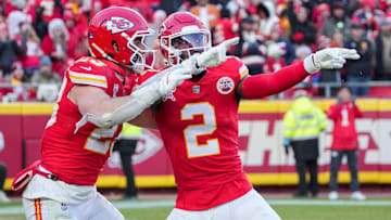 Dec 21, 2024; Kansas City, Missouri, USA; Kansas City Chiefs cornerback Joshua Williams (2) celebrates with linebacker Drue Tranquill (23) after a sack against the Houston Texans during the second half at GEHA Field at Arrowhead Stadium. Mandatory Credit: Denny Medley-Imagn Images
