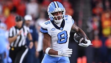 Oct 31, 2025; Syracuse, New York, USA; North Carolina Tar Heels wide receiver Kobe Paysour (8) runs after making a catch against the Syracuse Orange in the first quarter at the JMA Wireless Dome. Mandatory Credit: Mark Konezny-Imagn Images