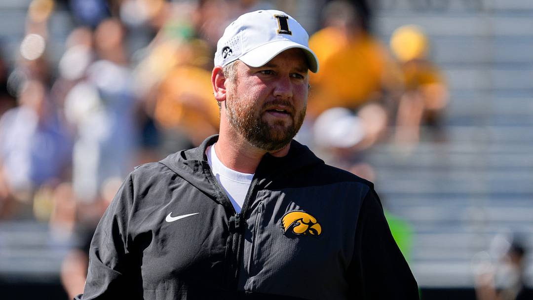 Iowa Hawkeyes Wide Receivers coach Jon Budmayr watches warmups before a football game against the Indiana Hoosiers Sept. 27, 2025 at Kinnick Stadium in Iowa City, Iowa. Iowa Hawkeyes Wide Receivers coach Jon Budmayr watches warmups before a football game against the Indiana Hoosiers Sept. 27, 2025 at Kinnick Stadium in Iowa City, Iowa.
