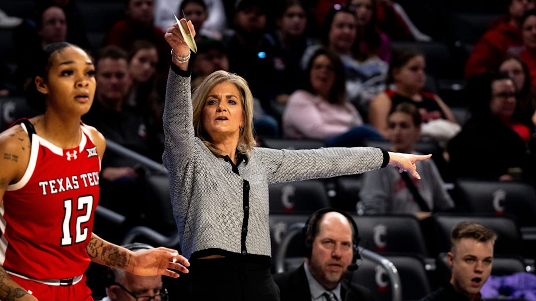 Texas Tech Raiders head coach Krista Gerlich points in the first quarter of the NCAA basketball game between Cincinnati Bearcats and Texas Tech Raiders at Fifth Third Arena in Cincinnati on Saturday, Feb. 3, 2024.