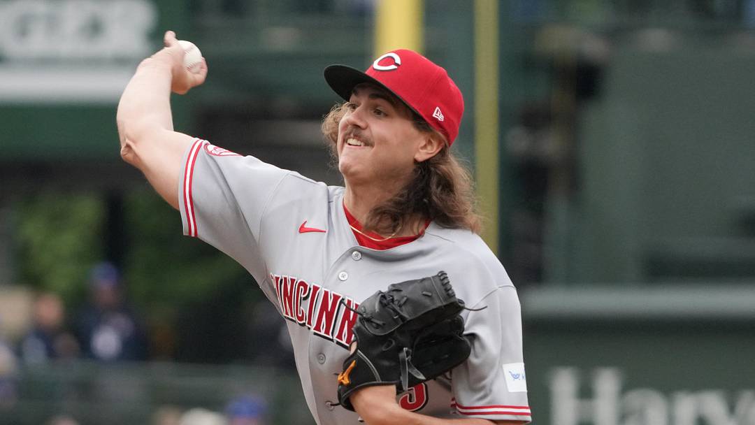 May 7, 2026; Chicago, Illinois, USA;  Cincinnati Reds pitcher Rhett Lowder (25) throws the ball against the Chicago Cubs during the first inning at Wrigley Field. Mandatory Credit: David Banks-Imagn Images