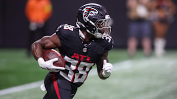 Aug 8, 2025; Atlanta, Georgia, USA; Atlanta Falcons running back Nathan Carter (38) runs the ball against the Detroit Lions in the first quarter at Mercedes-Benz Stadium. Mandatory Credit: Brett Davis-Imagn Images