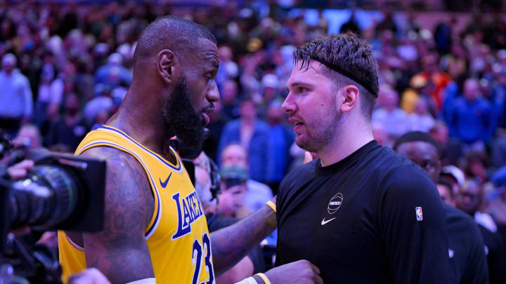 Dec 12, 2023; Dallas, Texas, USA; Los Angeles Lakers forward LeBron James (23) talks with Dallas Mavericks guard Luka Doncic (77) after the Mavericks defeat the Lakes at the American Airlines Center. Mandatory Credit: Jerome Miron-USA TODAY Sports