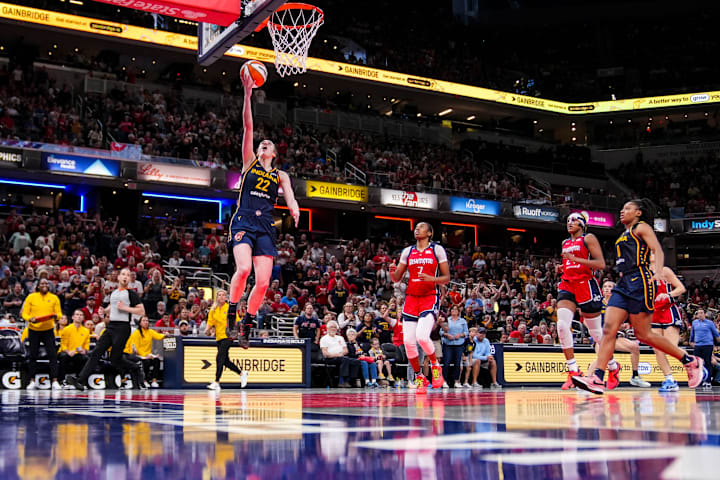 Indiana Fever guard Caitlin Clark goes up for a layup against the Washington Mystics. 