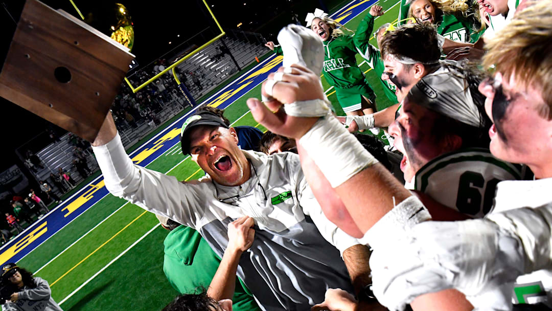 Wall head coach Craig Slaughter celebrates his team's win over Gunter during Friday’s Region I-4A DI football semifinal in Stephenville Dec. 12, 2025. Final score was 28-25, Wall.