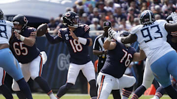 Sep 8, 2024; Chicago, Illinois, USA; Chicago Bears quarterback Caleb Williams (18) passes against the Tennessee Titans during the first half at Soldier Field. Mandatory Credit: David Banks-Imagn Images