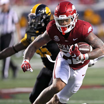 Arkansas Razorbacks running back Ja’Quinden Jackson (22) rushes during the second quarter against the Arkansas-Pine Bluff Golden Lions at War Memorial Stadium. 