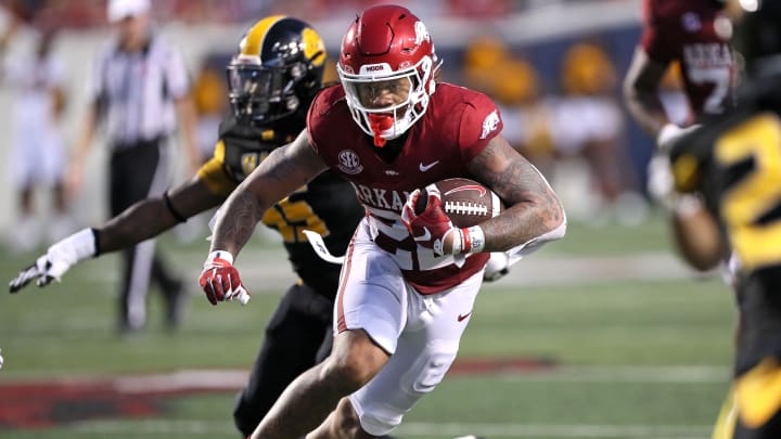 Arkansas Razorbacks running back Ja’Quinden Jackson (22) rushes during the second quarter against the Arkansas-Pine Bluff Golden Lions at War Memorial Stadium. 