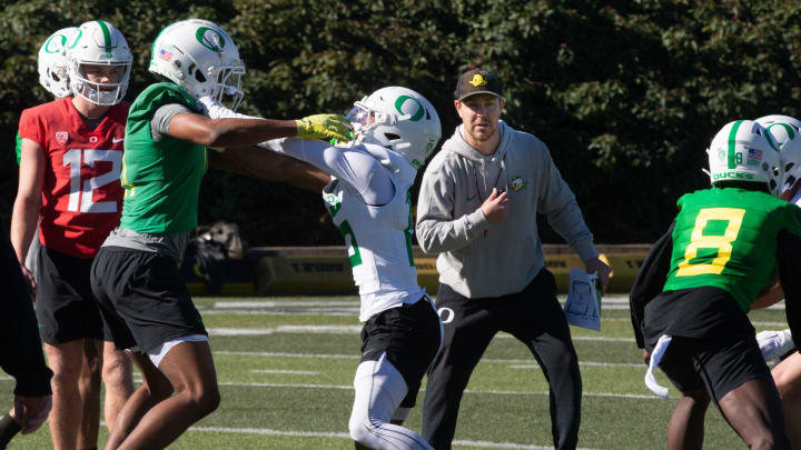 Oregon Offensive Coordinator Will Stein, right, supervises a drill during the second spring practice for the Oregon Duck football team on Saturday, March 16, 2024.