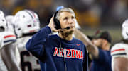 Nov 28, 2025; Tempe, Arizona, USA; Arizona Wildcats head coach Brent Brennan against the Arizona State Sun Devils during the 99th Territorial Cup at Mountain America Stadium. Mandatory Credit: Mark J. Rebilas-Imagn Images