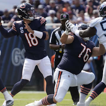 Bears offensive linemen Coleman Shelton (65) and Teven Jenkins set up a nice pocket for Caleb Williams to fire downfield against the Titans.