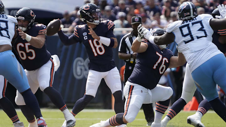 Bears offensive linemen Coleman Shelton (65) and Teven Jenkins set up a nice pocket for Caleb Williams to fire downfield against the Titans.