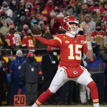 Jan 13, 2024; Kansas City, Missouri, USA; Kansas City Chiefs quarterback Patrick Mahomes (15) throws under pressure from Miami Dolphins defensive end Emmanuel Ogbah (91) during the first half of the 2024 AFC wild card game at GEHA Field at Arrowhead Stadium. Mandatory Credit: Denny Medley-USA TODAY Sports