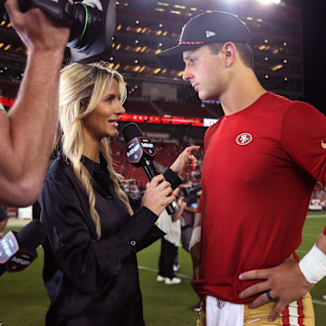 Sep 9, 2024; Santa Clara, California, USA; San Francisco 49ers quarterback Brock Purdy (13) talks with Monday Night Football's Laura Rutledge after the win against the New York Jets at Levi's Stadium. Mandatory Credit: David Gonzales-Imagn Images