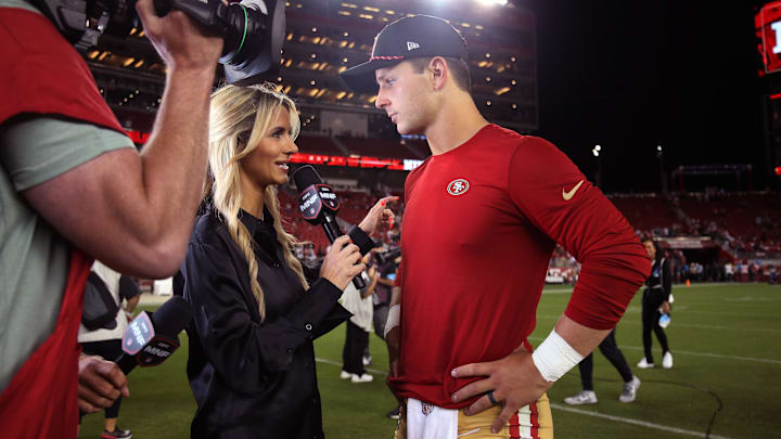 Sep 9, 2024; Santa Clara, California, USA; San Francisco 49ers quarterback Brock Purdy (13) talks with Monday Night Football's Laura Rutledge after the win against the New York Jets at Levi's Stadium. Mandatory Credit: David Gonzales-Imagn Images