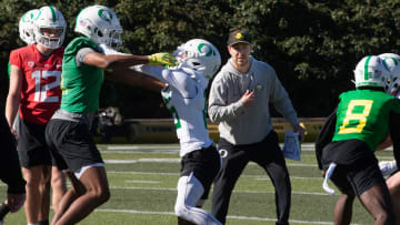 Oregon Offensive Coordinator Will Stein, right, supervises a drill during the second spring practice for the Oregon Duck football team on Saturday, March 16, 2024.