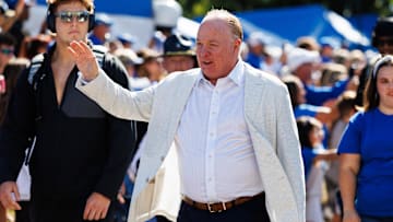 Aug 30, 2025; Lexington, Kentucky, USA; Kentucky Wildcats head coach Mark Stoops waves to the fans at Cat Walk before the game against the Toledo Rockets at Kroger Field. Mandatory Credit: Jordan Prather-Imagn Images