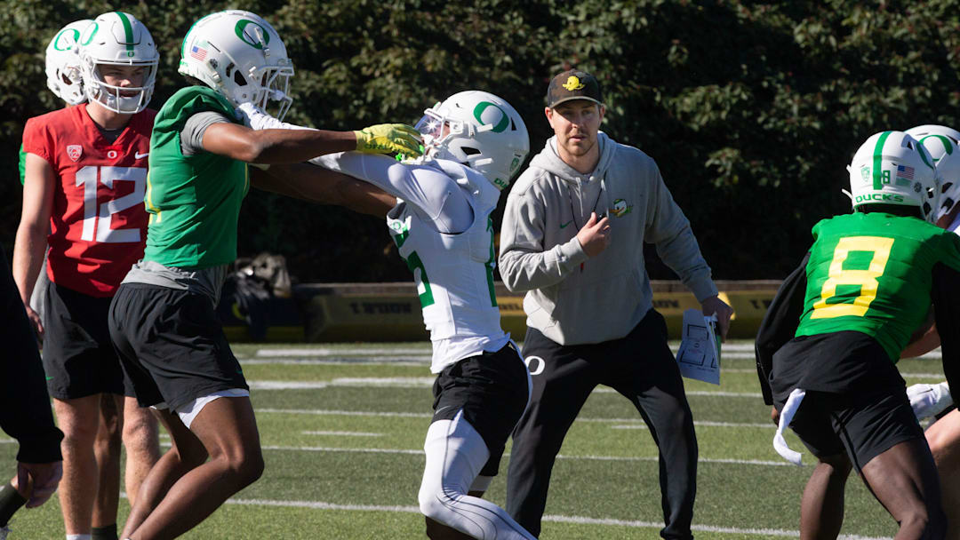 Oregon Offensive Coordinator Will Stein, right, supervises a drill during the second spring practice for the Oregon Duck football team on Saturday, March 16, 2024.