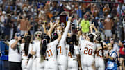 Jun 6, 2025; Oklahoma City, OK, USA;  Texas Longhorns player celebrate after beating the Texas Tech Red Raiders 10-4 to win the National Championship in game three of the NCAA Softball Women's College World Series finals at Devon Park. Mandatory Credit: Brett Rojo-Imagn Images