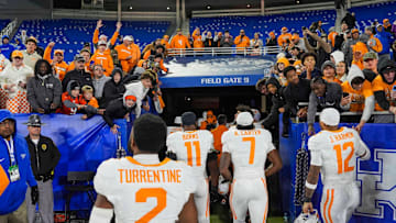 The Tennessee football team enters the tunnel while high-fiving fans after winning a NCAA football game against Kentucky at Kroger Field in Lexington, Kentucky on Oct. 25, 2025.