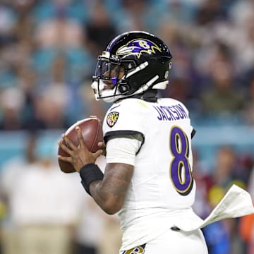 Oct 30, 2025; Miami Gardens, Florida, USA; Baltimore Ravens quarterback Lamar Jackson (8) looks to pass against the Miami Dolphins in the second quarter at Hard Rock Stadium. Mandatory Credit: Nathan Ray Seebeck-Imagn Images