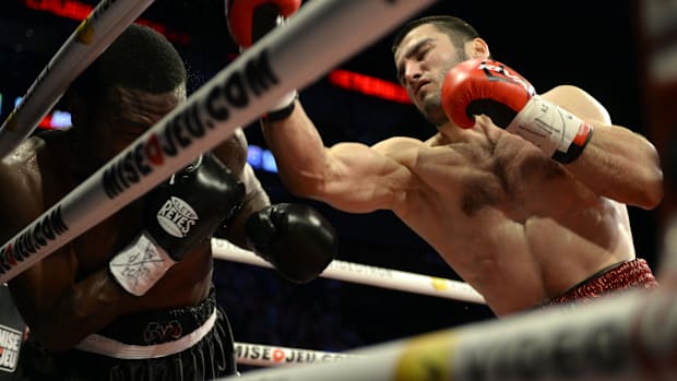 Artur Beterbiev delivers a punch to his opponent