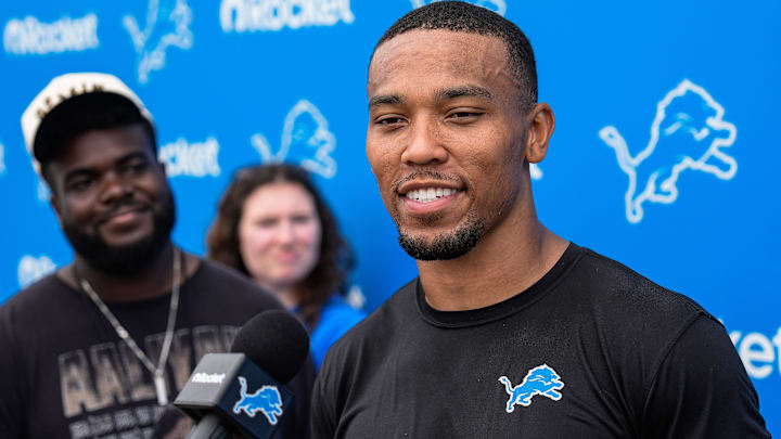 Detroit Lions wide receiver Amon-Ra St. Brown (14) answers a question after practice during training camp at Meijer Performance Center in Allen Park on Saturday, July 26, 2025.