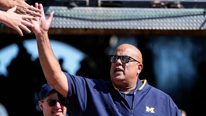 Michigan athletic director Warde Manuel high-fives fans as he walks down the tunnel for warm up before the USC game at Michigan Stadium in Ann Arbor on Saturday, Sept. 21, 2024. Michigan athletic director Warde Manuel high-fives fans as he walks down the tunnel for warm up before the USC game at Michigan Stadium in Ann Arbor on Saturday, Sept. 21, 2024.