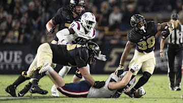 Defensive end Jacob Merrifield (50), shown here in a game with Florida Atlantic against Purdue, transferred to USF for this season and will provided needed depth to the defensive line.