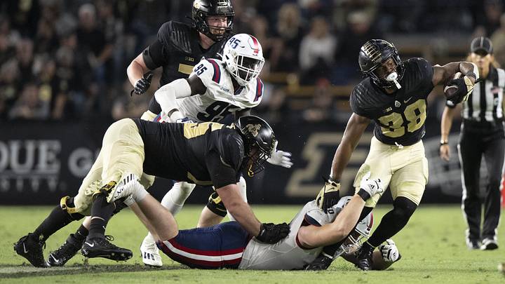 Defensive end Jacob Merrifield (50), shown here in a game with Florida Atlantic against Purdue, transferred to USF for this season and will provided needed depth to the defensive line.