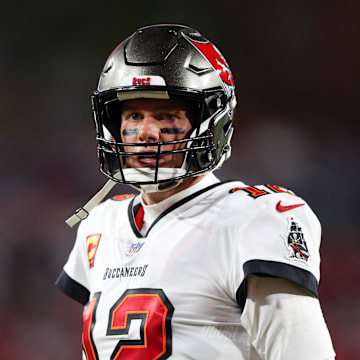 Jan 16, 2023; Tampa, Florida, USA; Tampa Bay Buccaneers quarterback Tom Brady (12) looks on before a  wild card game against the Dallas Cowboys at Raymond James Stadium. Mandatory Credit: Nathan Ray Seebeck-Imagn Images