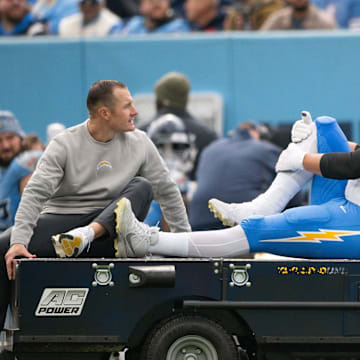 Nov 2, 2025; Nashville, Tennessee, USA;  Los Angeles Chargers offensive tackle Joe Alt (76) gets carted off against the Tennessee Titans during the first half at Nissan Stadium. Mandatory Credit: Steve Roberts-Imagn Images