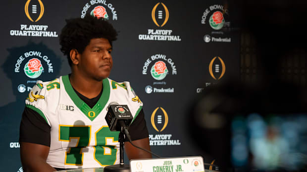Oregon offensive lineman Josh Conerly Jr. speaks during media day for the Oregon Ducks in Los Angeles ahead of the Rose Bowl 