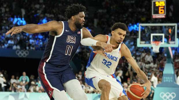 Aug 10, 2024; Paris, France; France power forward Victor Wembanyama (32) controls the ball against United States.