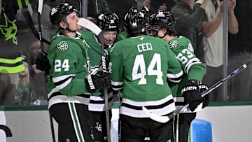 Mar 6, 2025; Dallas, Texas, USA; Dallas Stars center Roope Hintz (24) and left wing Jason Robertson (21) and defenseman Cody Ceci (44) and center Wyatt Johnston (53) celebrate the game tying goal scored by Robertson against the Calgary Flames during the third period at the American Airlines Center. Mandatory Credit: Jerome Miron-Imagn Images