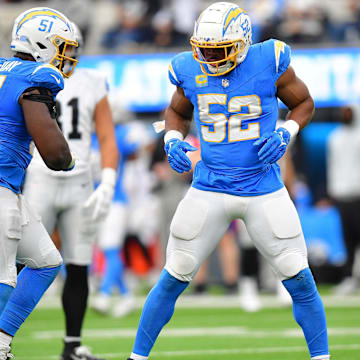 Oct 1, 2023; Inglewood, California, USA; Los Angeles Chargers linebacker Khalil Mack (52) reacts after sacking Las Vegas Raiders quarterback Aidan O'Connell (4) with defensive tackle Sebastian Joseph-Day (51) during the second half at SoFi Stadium. Mandatory Credit: Gary A. Vasquez-Imagn Images