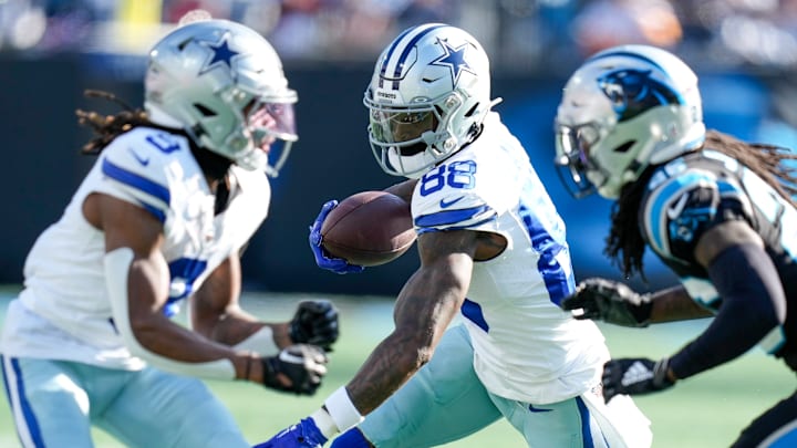 Dallas Cowboys wide receiver CeeDee Lamb eyes a block by KaVontae Turpin against the Carolina Panthers