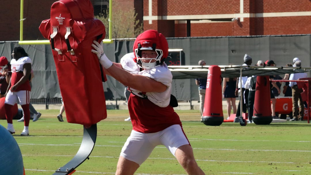 Oklahoma linebacker James Nesta hits a sled during one of the Sooners' spring practices. Oklahoma linebacker James Nesta hits a sled during one of the Sooners' spring practices.