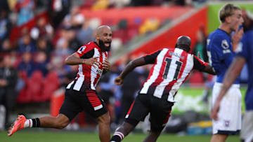 Bryan Mbuemo and Yoane Wissa celebrate the last gasp goal