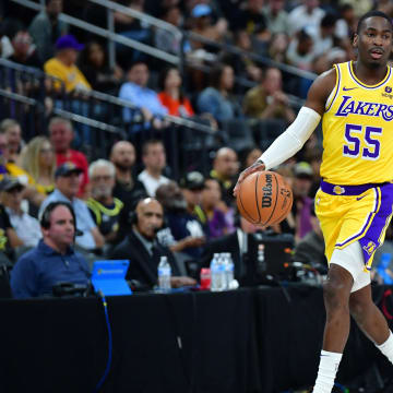 Oct 9, 2023; Las Vegas, Nevada, USA; Los Angeles Lakers guard D'Moi Hodge (55) controls the ball against the Brooklyn Nets during the second half at T-Mobile Arena. Mandatory Credit: Gary A. Vasquez-USA TODAY Sports