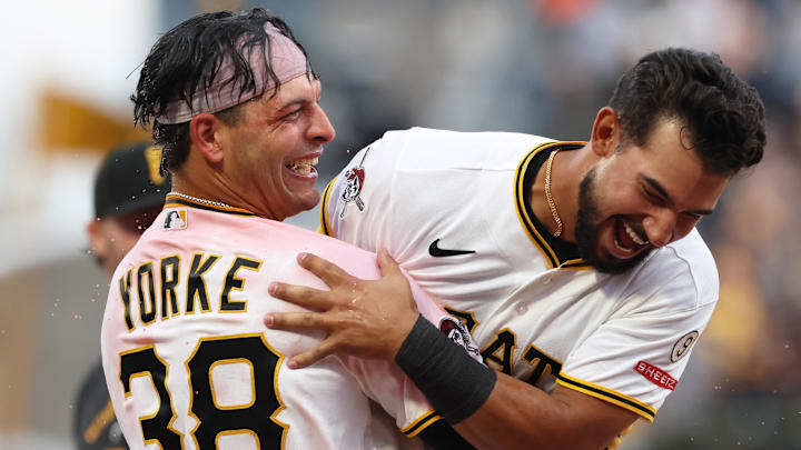 Apr 4, 2026; Pittsburgh, Pennsylvania, USA;  Pittsburgh Pirates designated hitter Nick Yorke (38) and third baseman Nick Gonzales (right) celebrate after Yorke hit a game winning walk-off single to defeat the Baltimore Orioles in the ninth inning at PNC Park. Mandatory Credit: Charles LeClaire-Imagn Images